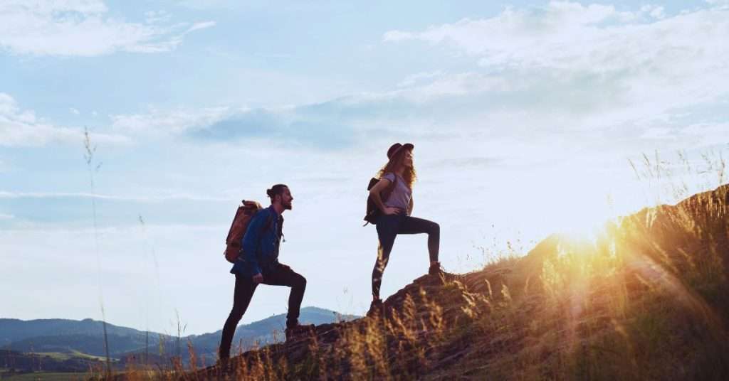 Travellers Climbing Up a Mountain